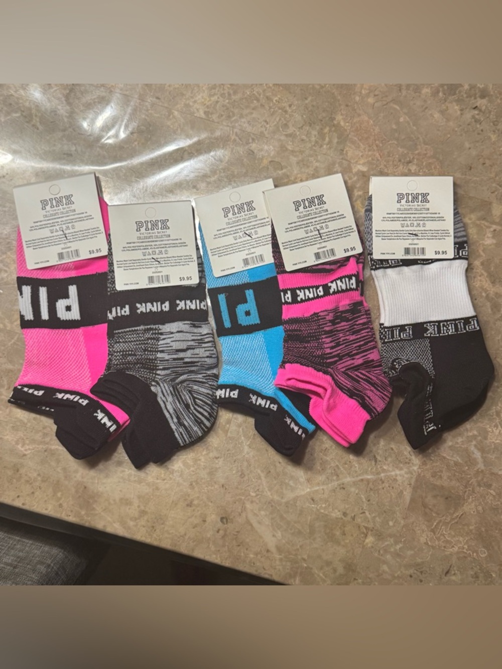 New Pink Victoria’s Secret Socks
With tags 
New Pink socks 
5 pairs included